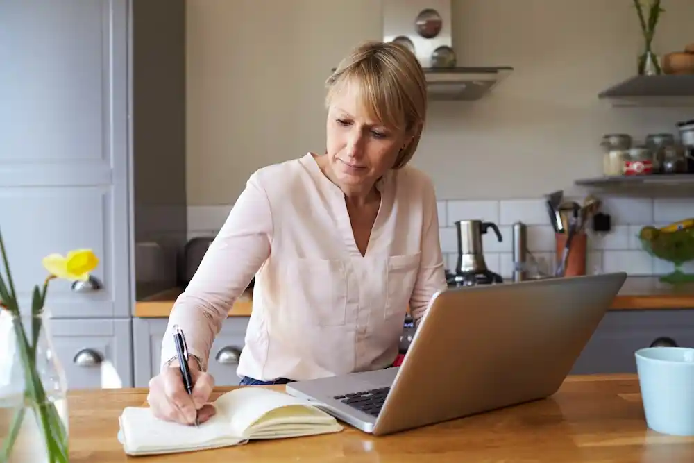 woman working from home at computer